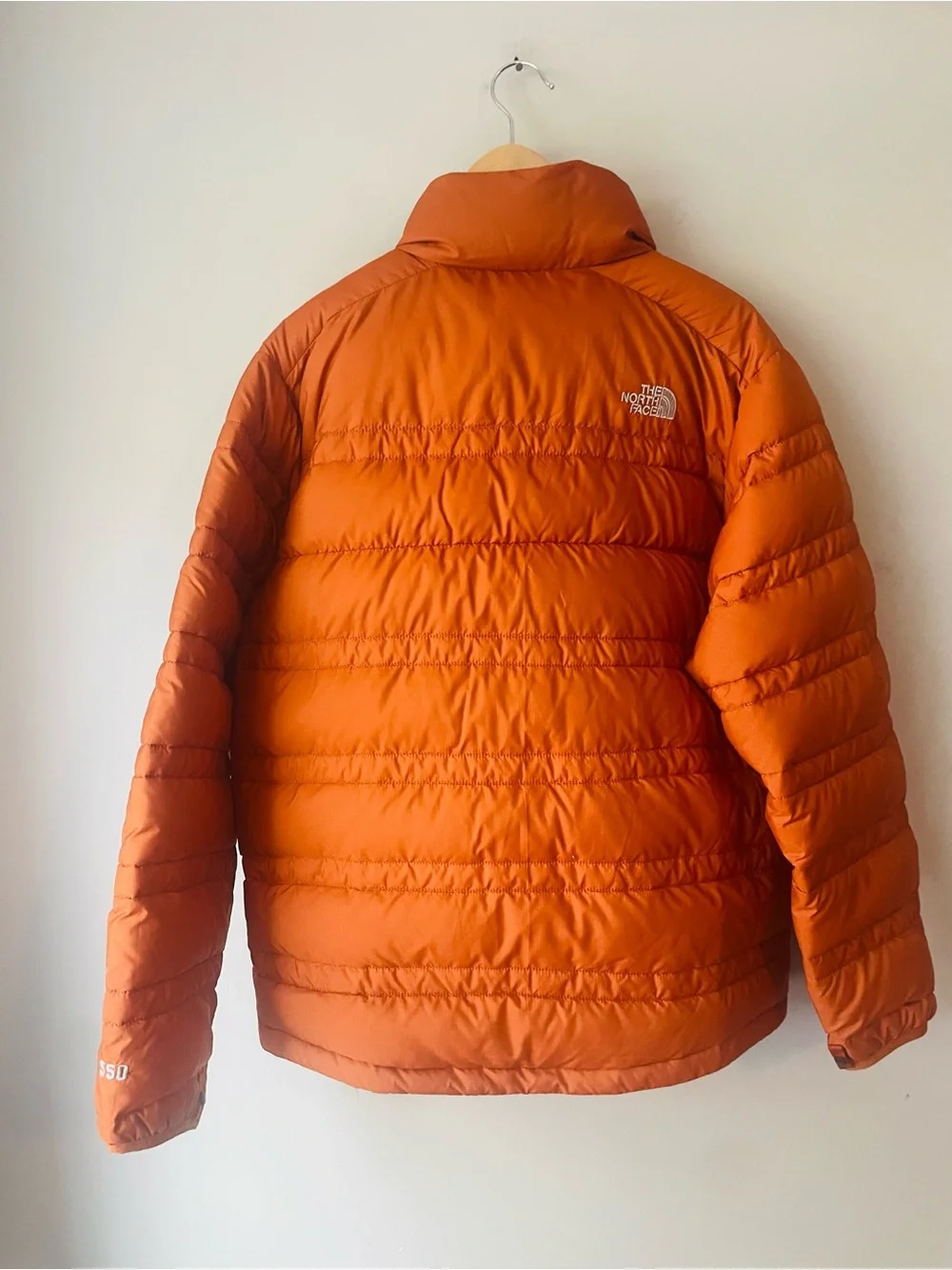 The North Face 550 Orange Rust Puffer Jacket